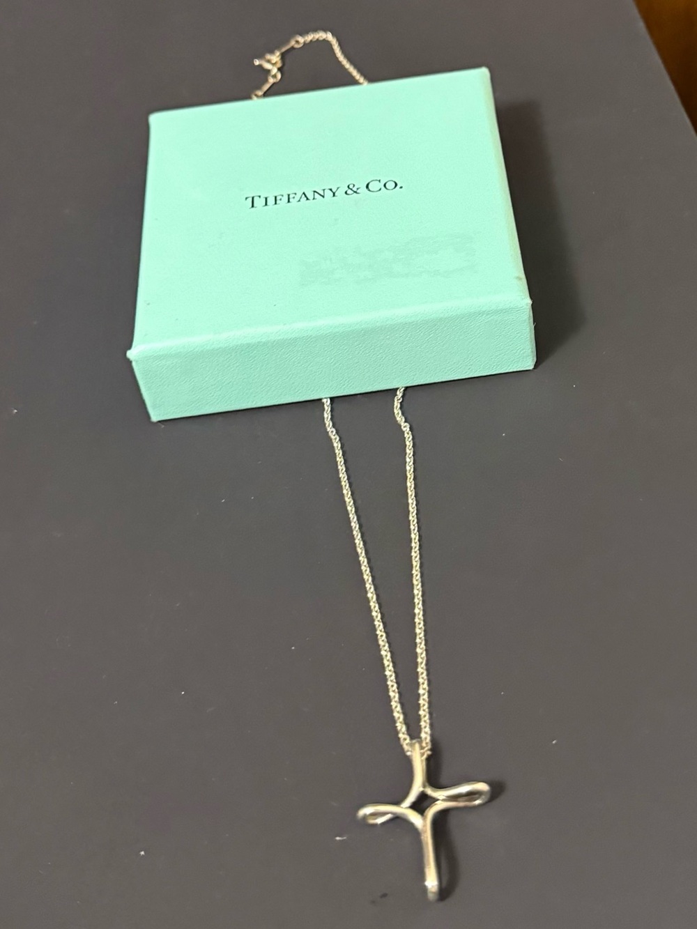 ELSA PERETTI
Tiffany & Co. Silver Polished Cross Pendant Necklace 

NO INCLUSION
